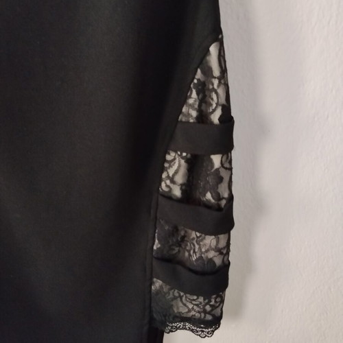 Black mini dress like new with open back and lace slit