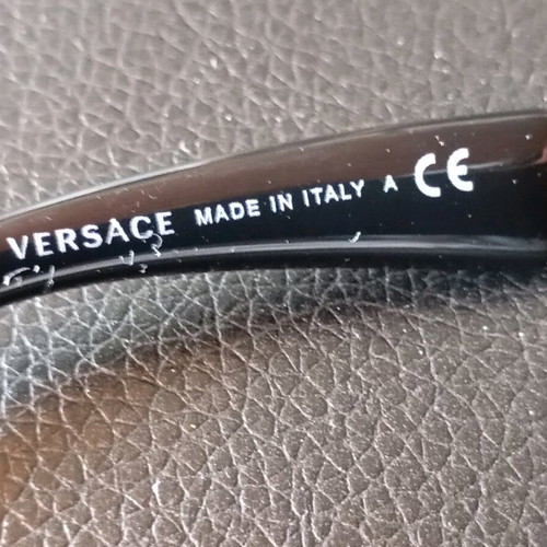 Versace 2197 women's sunglasses used, black and gold