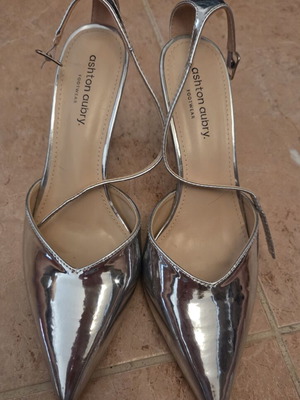 Ashton Aubry silver metallic slingback pumps