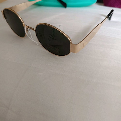Pervedere women's sunglasses new with oval lenses and gold frame
