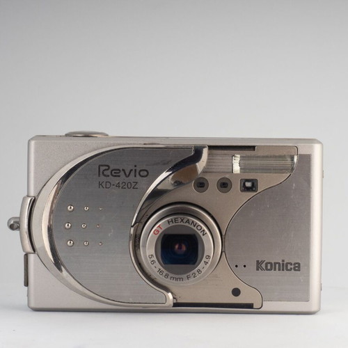 Konica Revio KD-420Z 4MP Digital Camera used with Battery Charger and 2GB SD Card