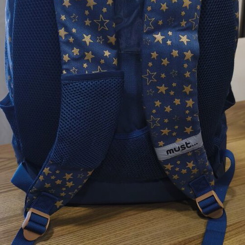 Must school backpack like new with three compartments and bottle holder