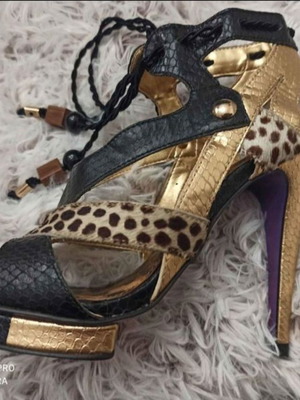 Carrano sandals like new with leopard fur and purple sole, size 37