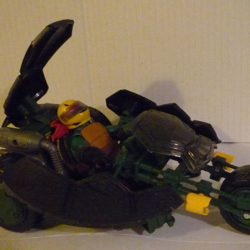 Playmates Teenage Mutant Ninja Turtles Ninja Stealth Bike with Raphael Figure used