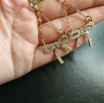 Bow earrings dangling new