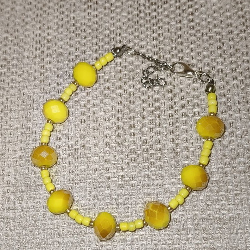 Handmade yellow bracelet with stainless steel beads