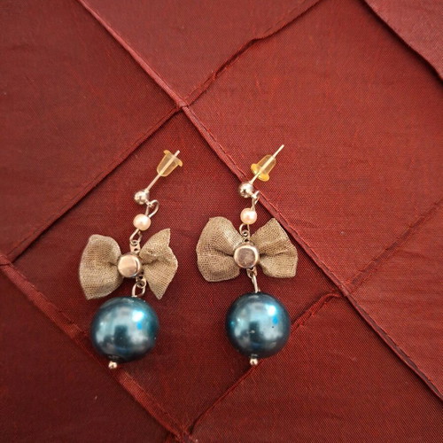 Handmade short silver earrings with blue bead and silver bow like new
