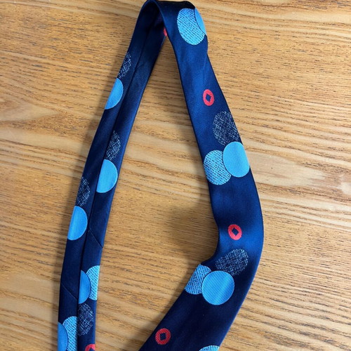 Vintage men's tie blue with geometric polka dots, retro style