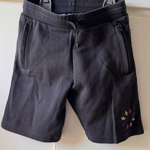 Adidas shorts with zipper pockets used, size 140cm, black