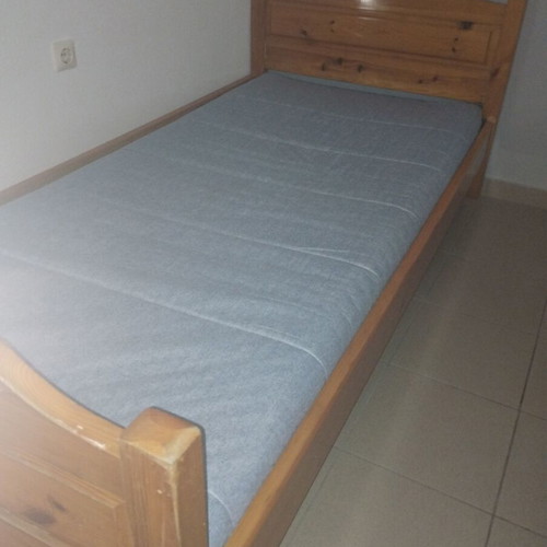 Single wooden bed with slats and IKEA mattress 200x90x10