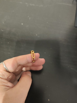 Adjustable stainless steel ring gold tone like new