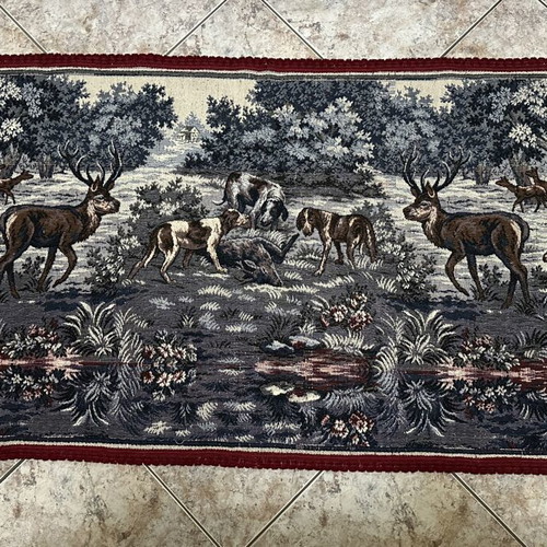 Handmade wall tapestry with deer and dogs