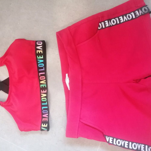 Girls' beach set used, swimsuit with crisscross back and shorts