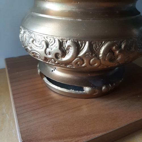Vintage metal vessel with wooden base used, decorative aroma container