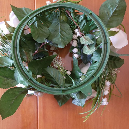Plastic wreath new with white flowers