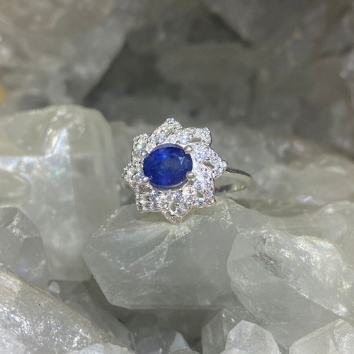 Handmade silver ring with natural blue sapphire and moissanites