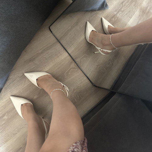 White elegant pumps size 40, new with back strap