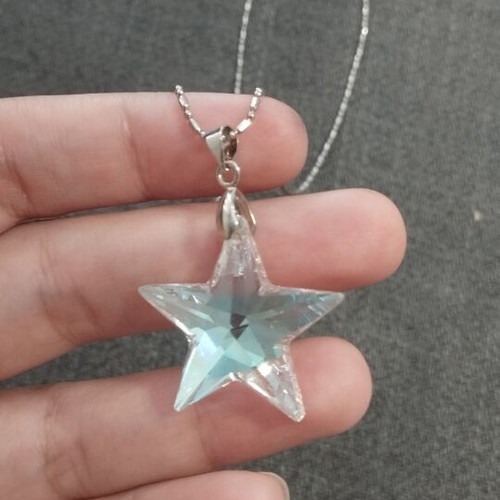 Star necklace with silver chain like new