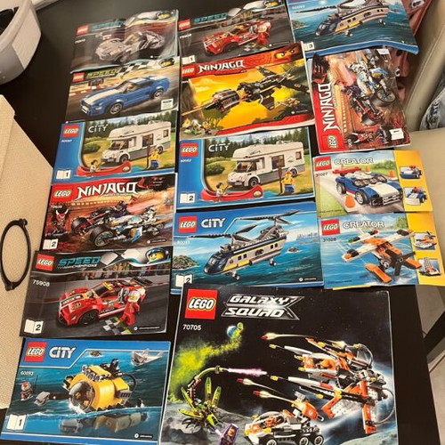 Lego Ninjago manuals and more used, pack of 15 pieces