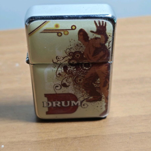 Drum promotional lighter used, functional, collectible
