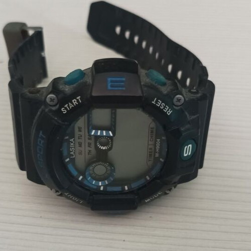 Electronic wristwatch used, battery replacement needed