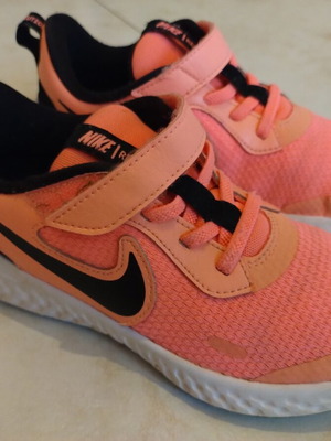 Nike kids' coral athletic shoes, size 33