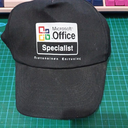 Vintage IBM pins, Oracle pen and Microsoft Office cap used