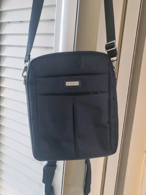 Men's bag used, crossbody and backpack style with multiple compartments