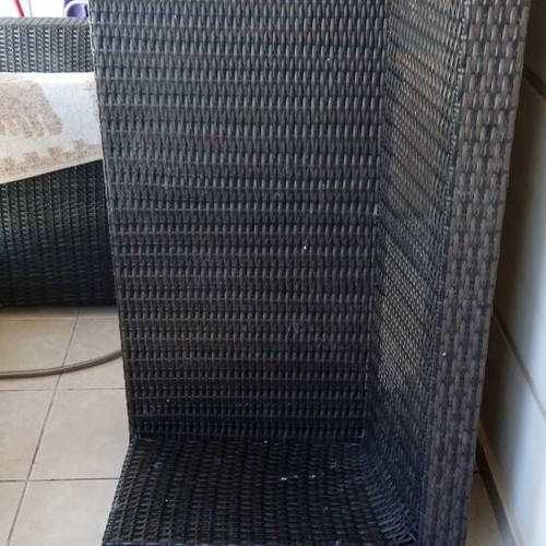 Two-seater sofa used, plastic bamboo weave