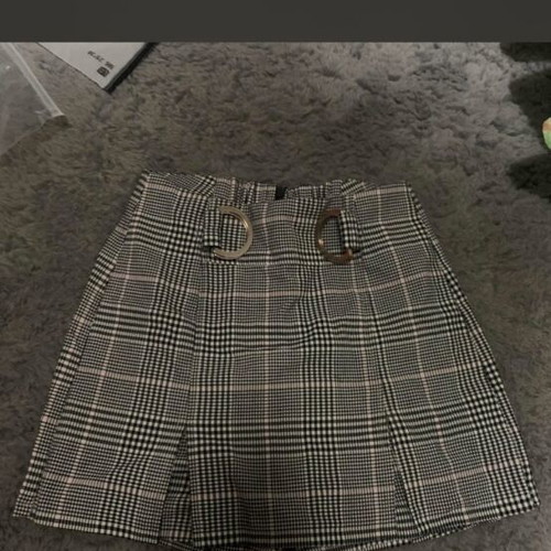 Skort used black and white plaid with silver buckles and pink detail