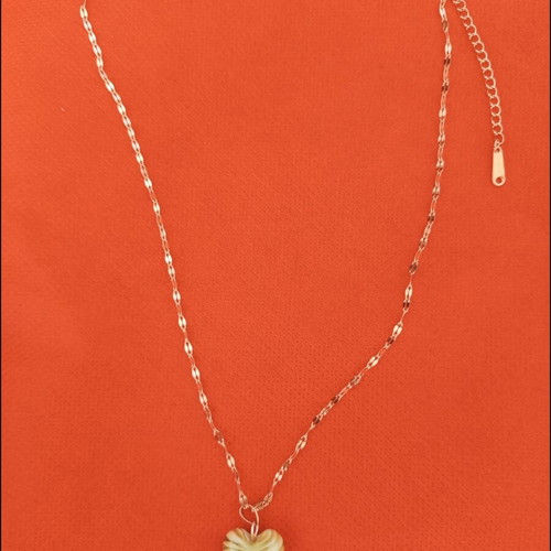 Handmade necklace with green glass heart and steel chain