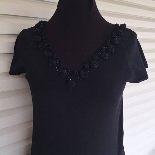 Black blouse new with decorative organza roses neckline, size M