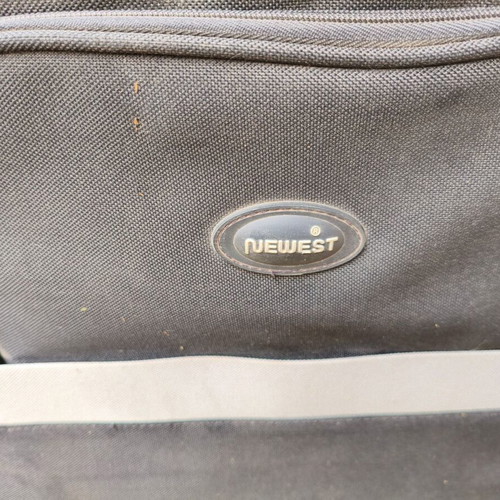 Wheeled suitcase used black