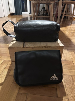 Two black leather toiletry bags, one Adidas
