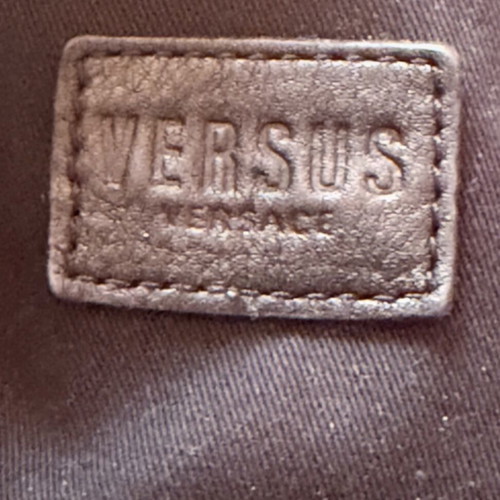Versace backpack like new with leather details yellow