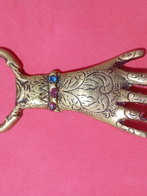 Handmade brass bottle opener used with decorative stones