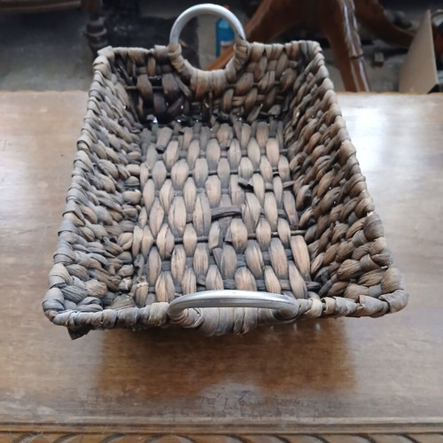 Woven decorative basket with metal handles like new