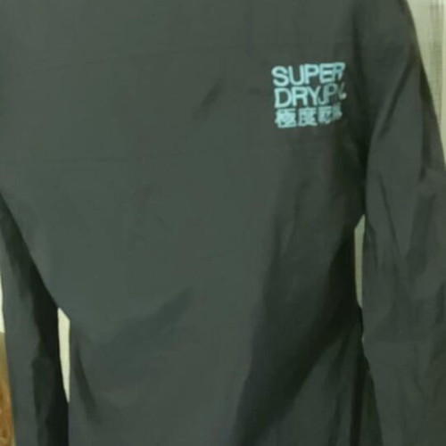 Superdry women's jacket used, size Large, black with blue fleece lining