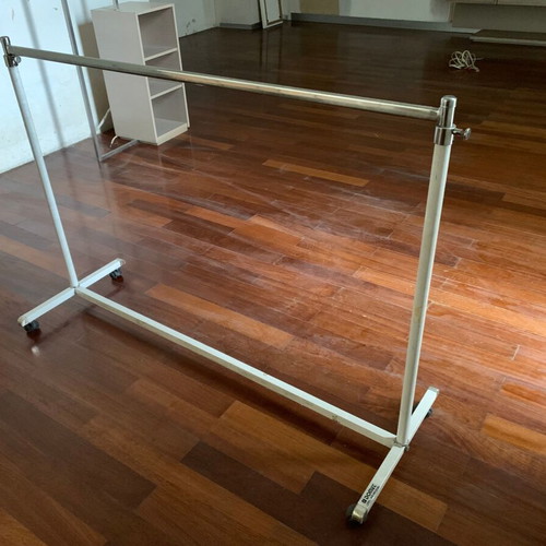 Metal clothes rack used, 155 cm width with adjustable height