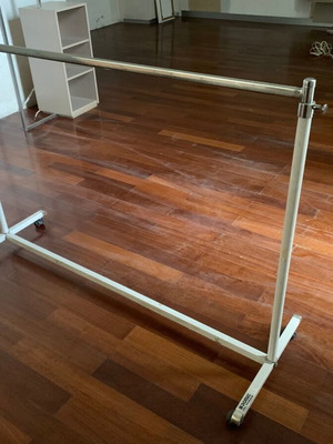 Metal clothes rack used, 155 cm width with adjustable height