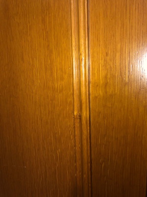 Wardrobe doors and knobs made of solid oak wood