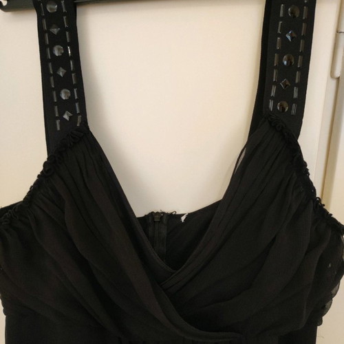 Black blouse with fringes used and black evening dress