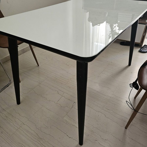 Glass dining table, white top with black legs