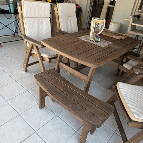 Wooden veranda dining set with folding chairs and cushions, like new