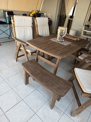 Wooden veranda dining set with folding chairs and cushions, like new
