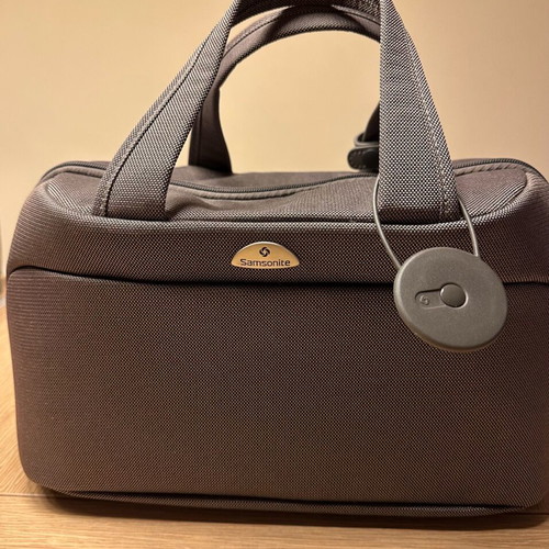 Samsonite toiletry bag grey like new with strap and lock