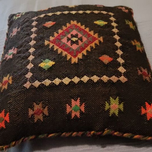 Handwoven pillow used, handmade