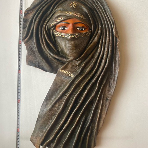 Leather wall mask like new, female face from Tunisia
