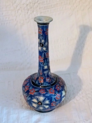 Porcelain vase hand-painted used with embossed designs