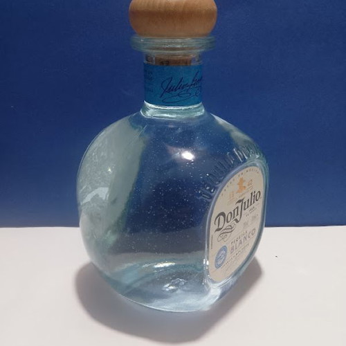 Don Julio tequila bottle like new with tsipouro and 2 shot glasses